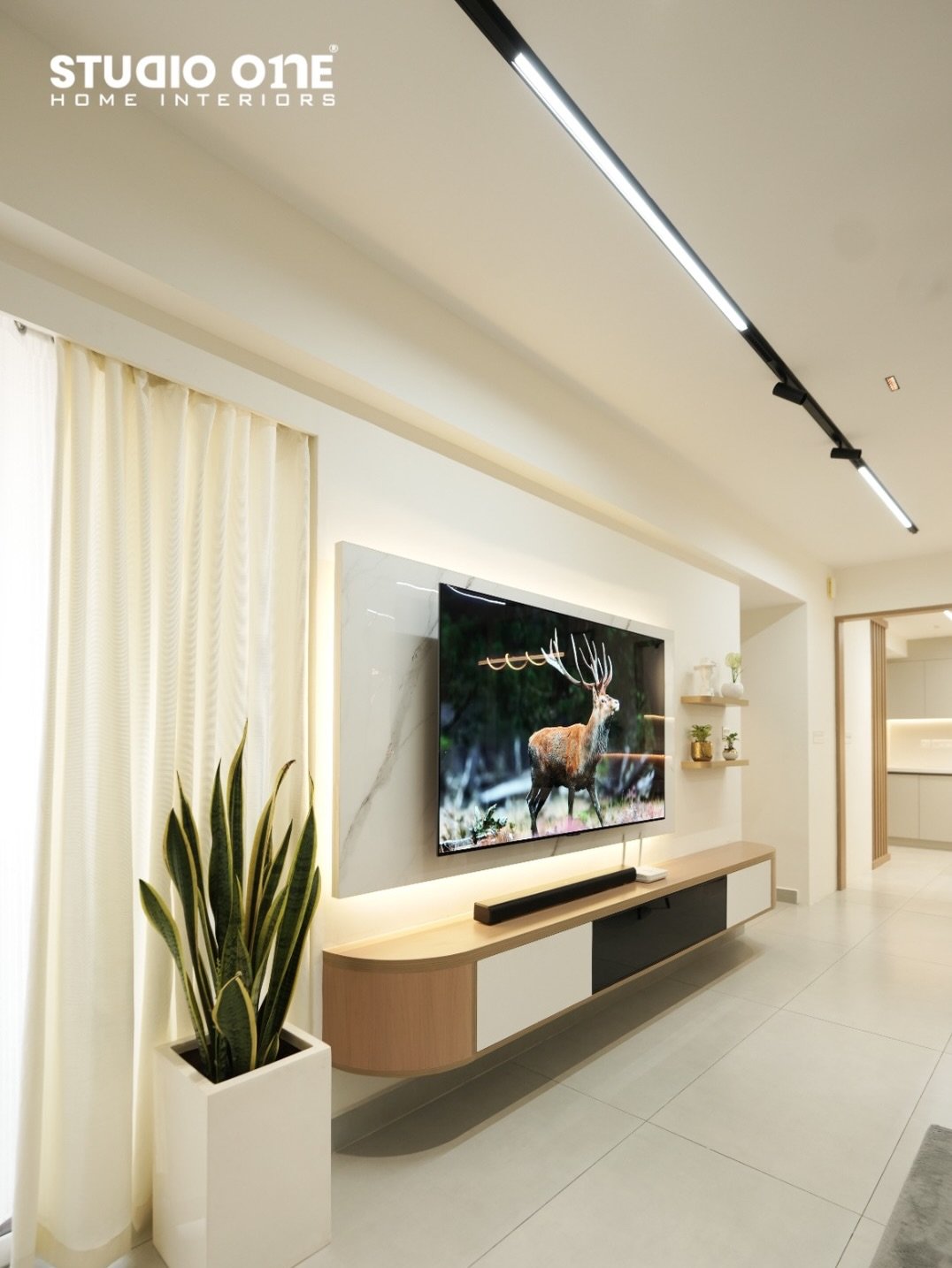 Curved Floating Media Unit by Studio One Interiors